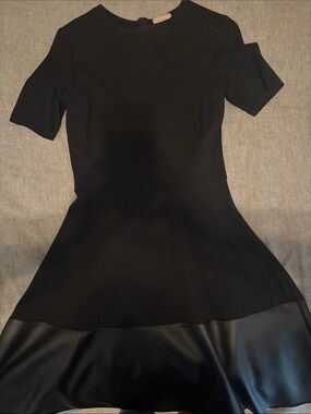 Black Short-Sleeve Fit & Flare Mini Dress with Faux Leather Hem